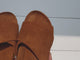 @falonbrianne influencer showing the Kea suede slide sandals in caramel. ClosedCaption