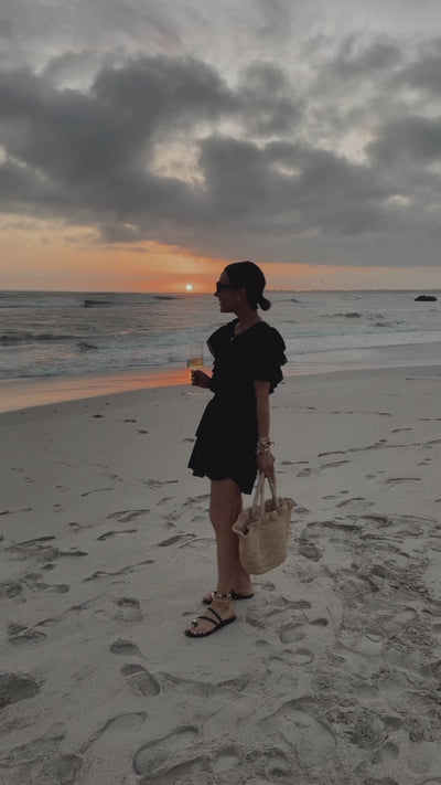 Shannon Pulsifer wearing Itsybitsybird sandals with various outfits at the beach.
