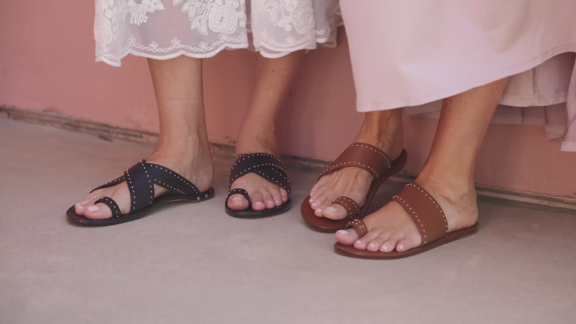 Video of women wearing Finch Stud leather studded toe-ring sandal in tan and Curlew studded toe-ring sandal in black