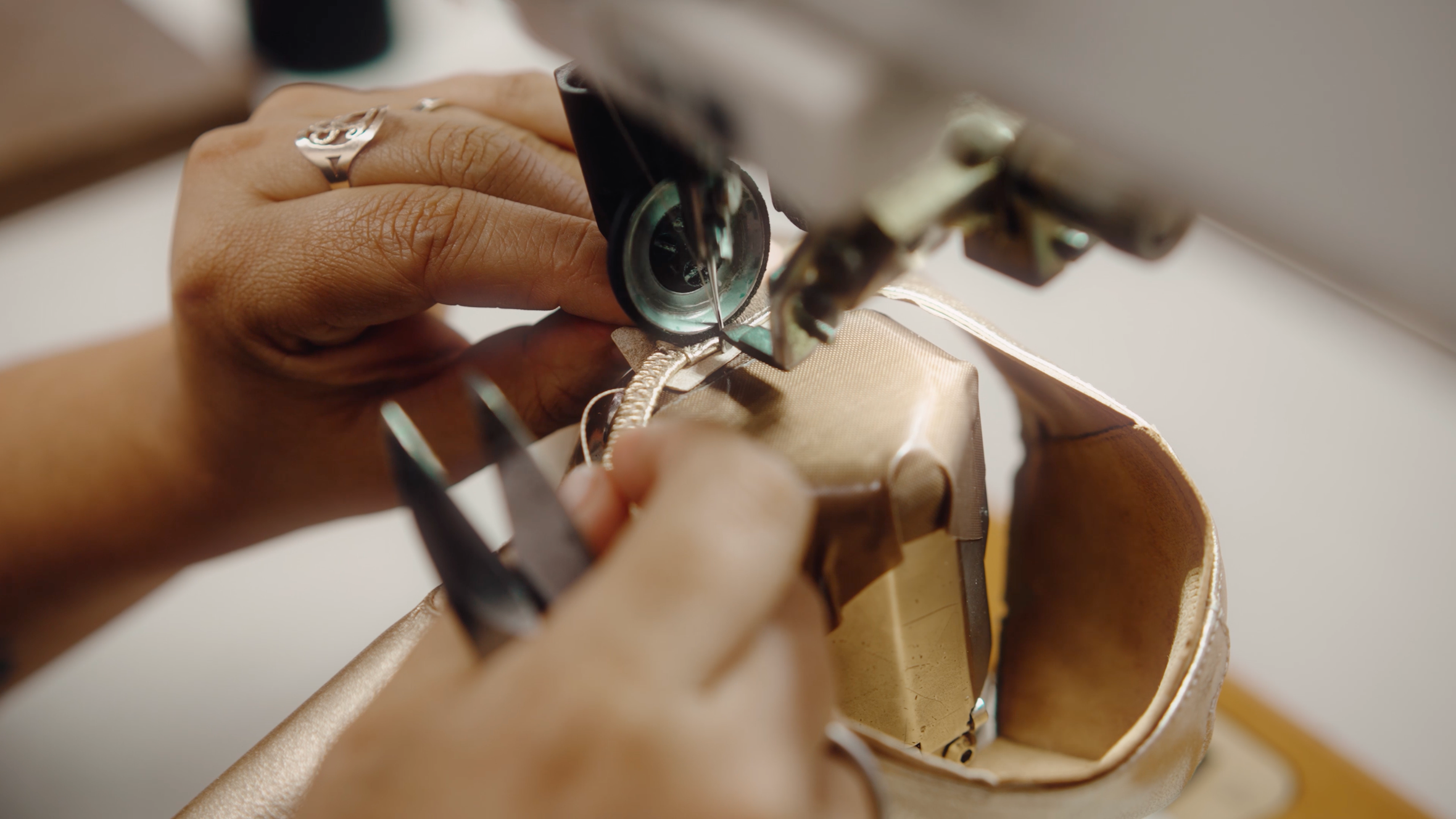 Video of artisan workers handcrafting Crane Bow leather mary jane show in factory
