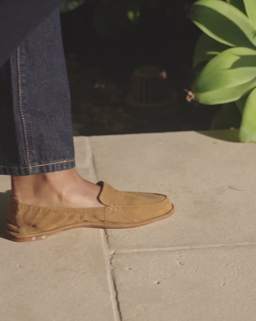 Video of woman wearing Griffin suede loafer in toffee with jeans