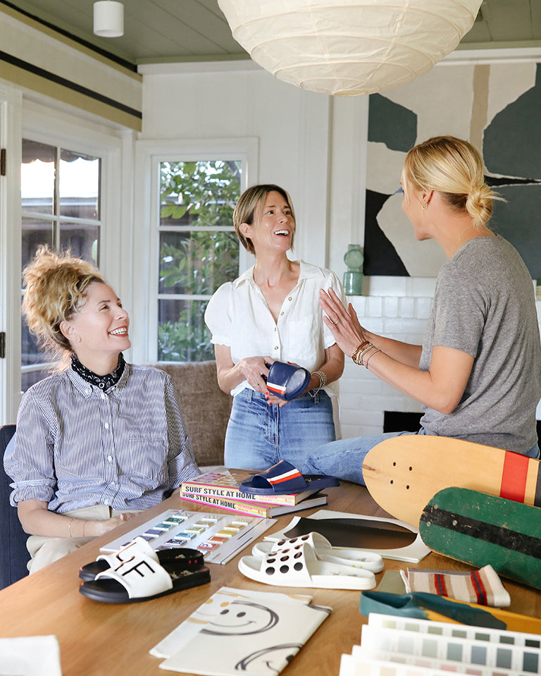 Raili Clasen with Birgit and Kenna reviewing the Railibird sandal collaboration