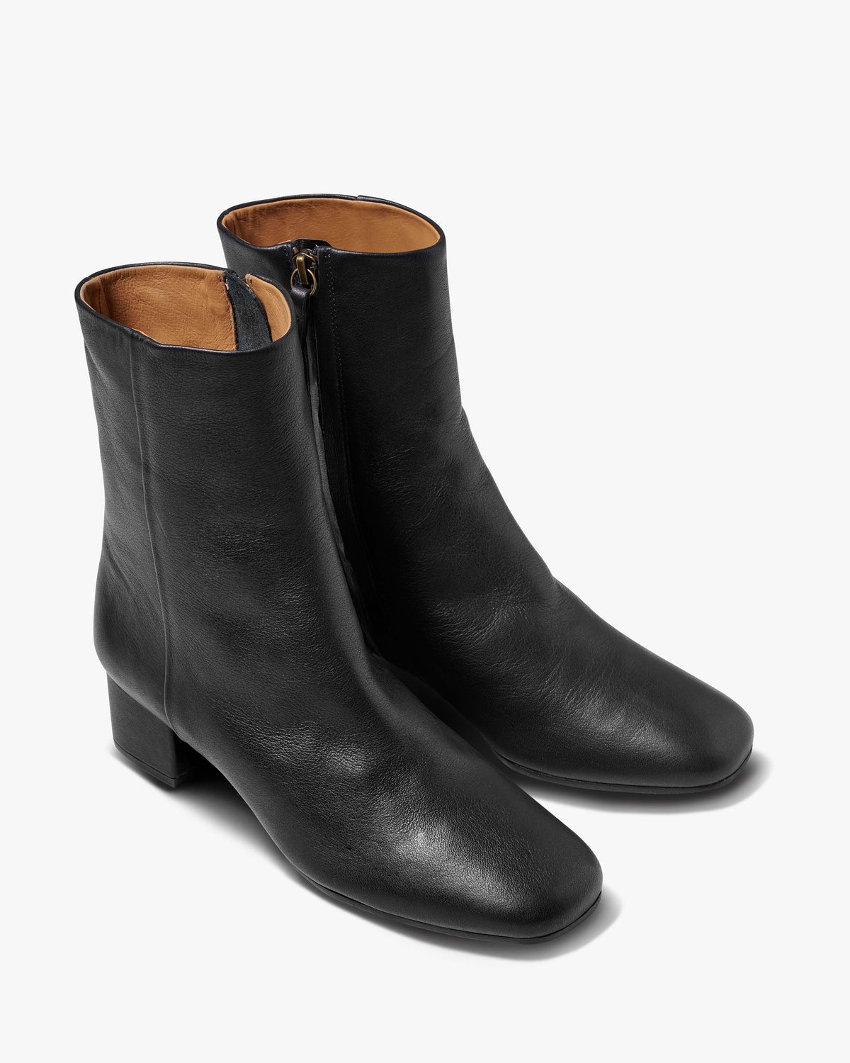 Raven leather heeled boots in black - product angle shot