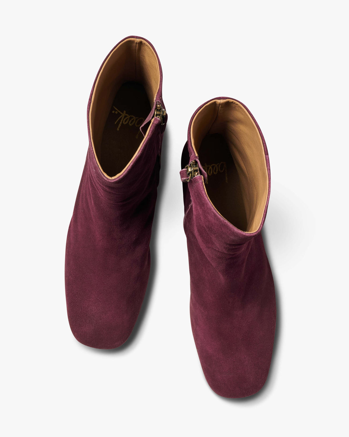 Raven suede heeled boots in prune - product top shot