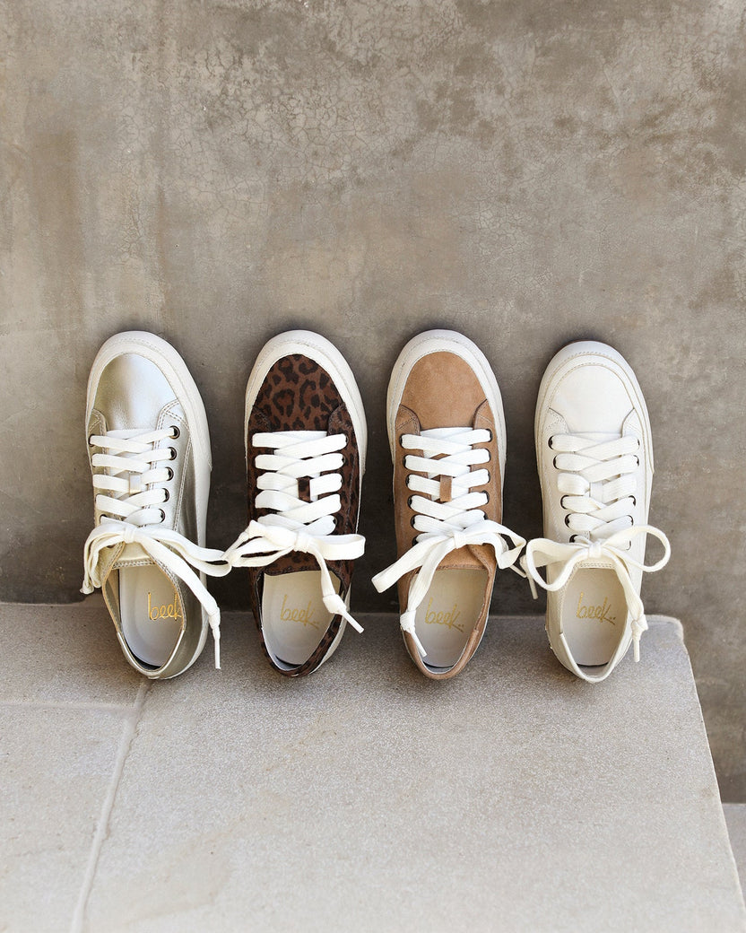 Group shot of Sandpiper suede sneakers in platinum leather, leopard suede, oat suede, white leather