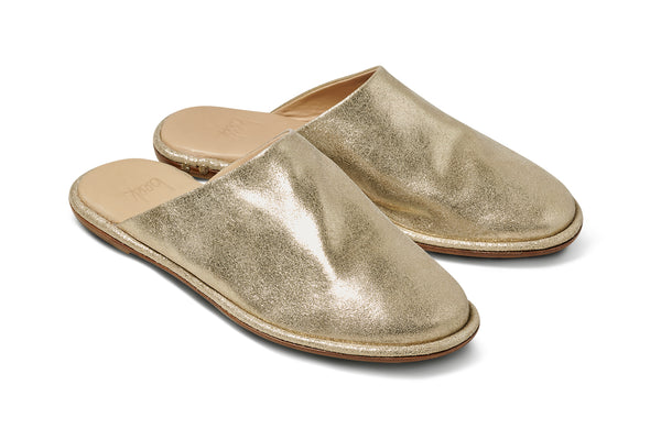 Seagull leather mules in gold - product angle shot