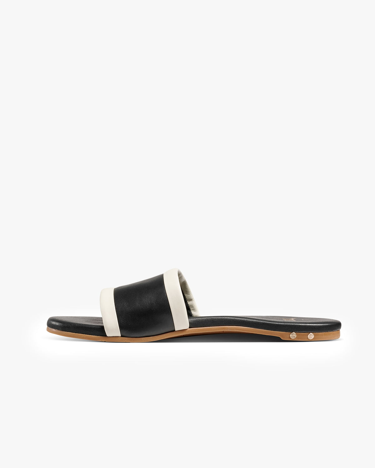 Shorebird leather slide sandals in black/vanilla - product top shot