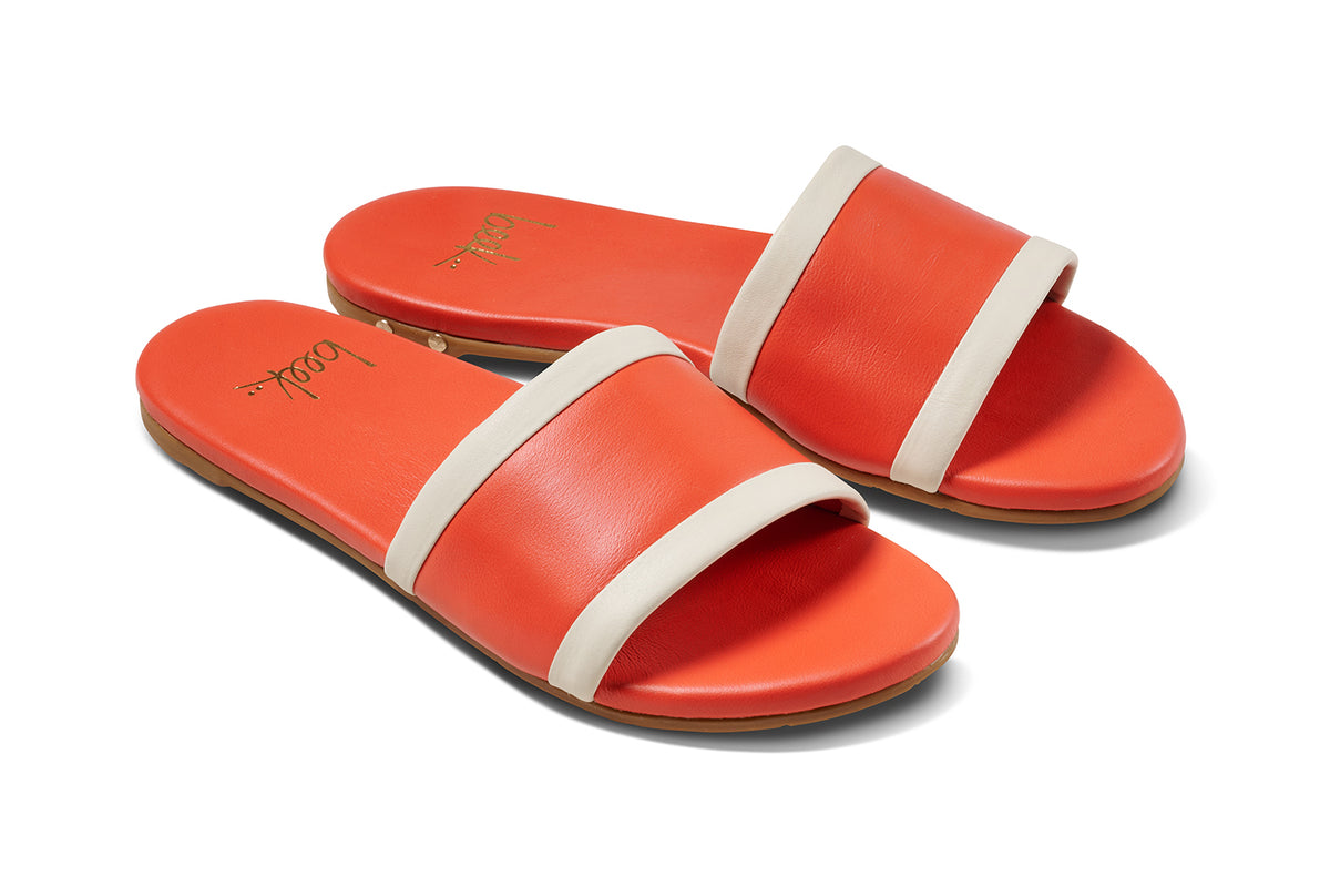 Shorebird leather slide sandals in tomato/vanilla - product angle shot