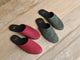 Group shot of Siskin suede mules in port and ivy.