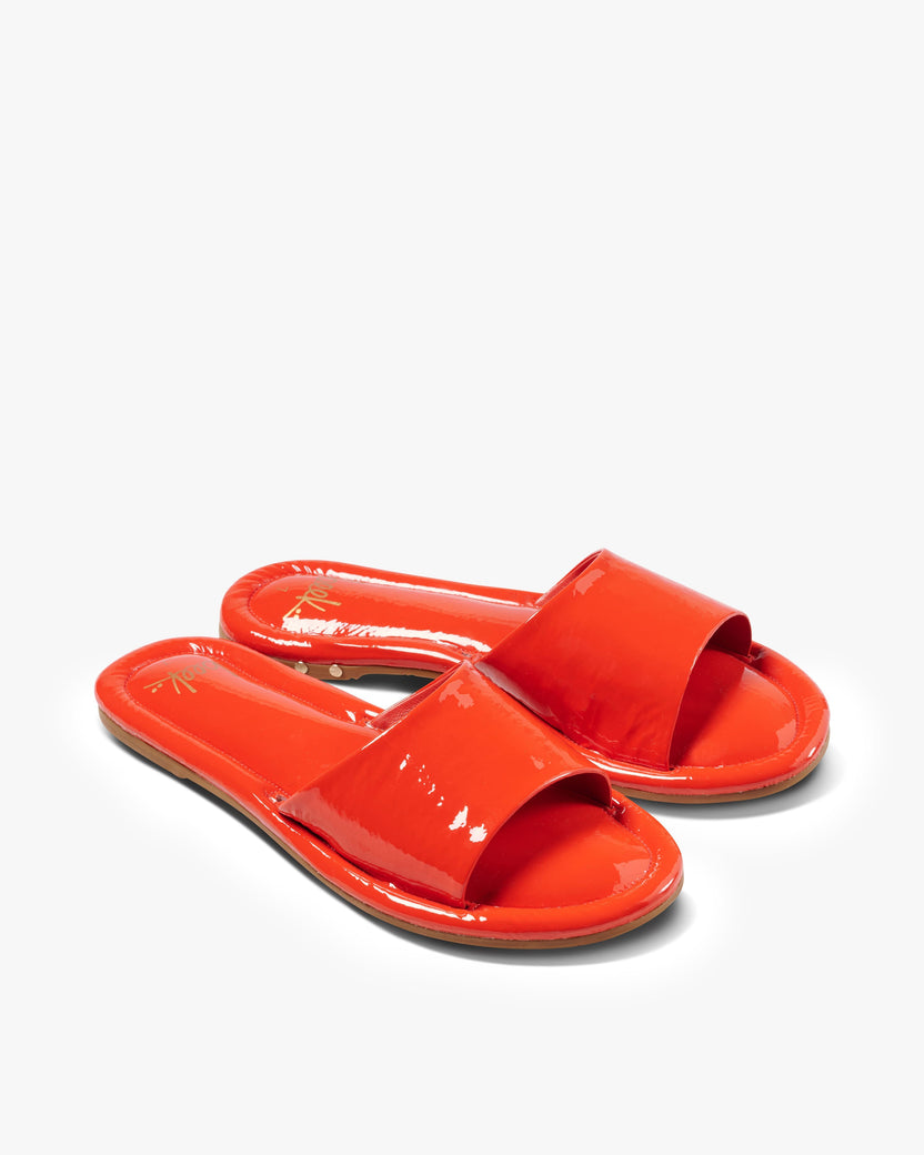 Songlark patent leather slide sandal in tomato - product angle shot