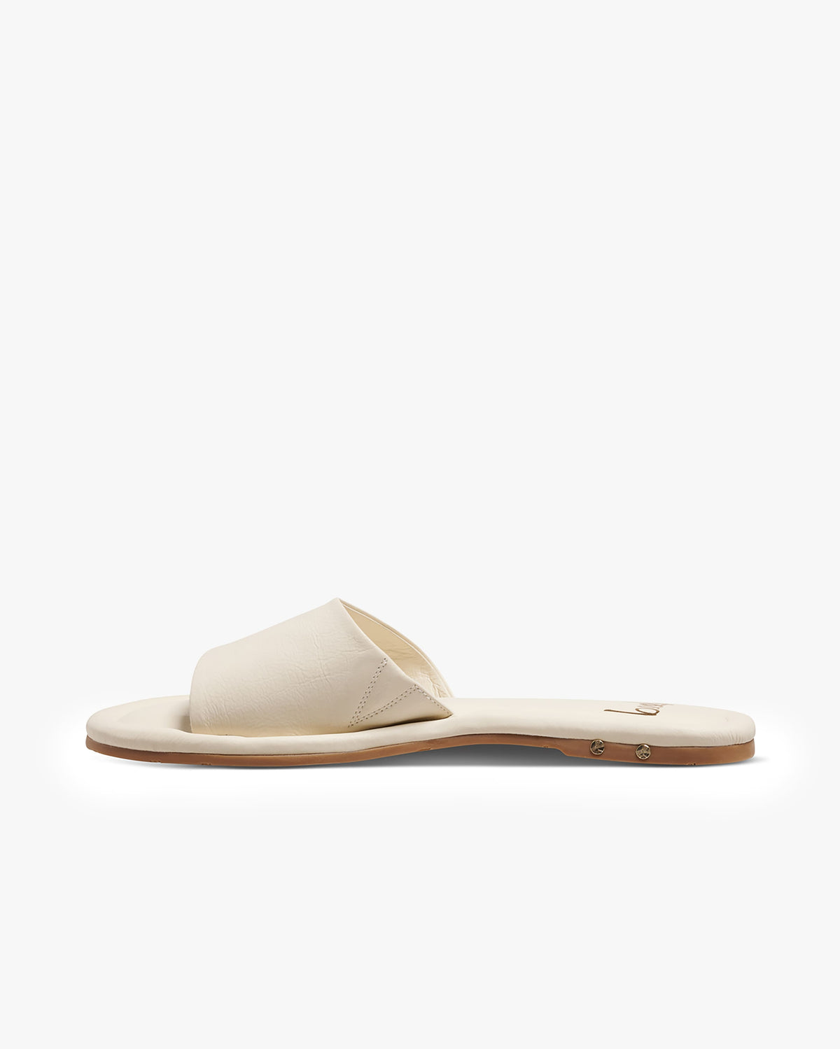 Songlark leather slide sandal in vanilla - product side shot