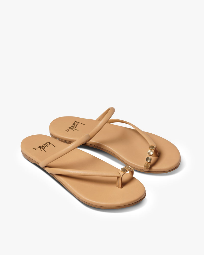 Starbird leather studded toe-ring sandal in beach - product angle shot