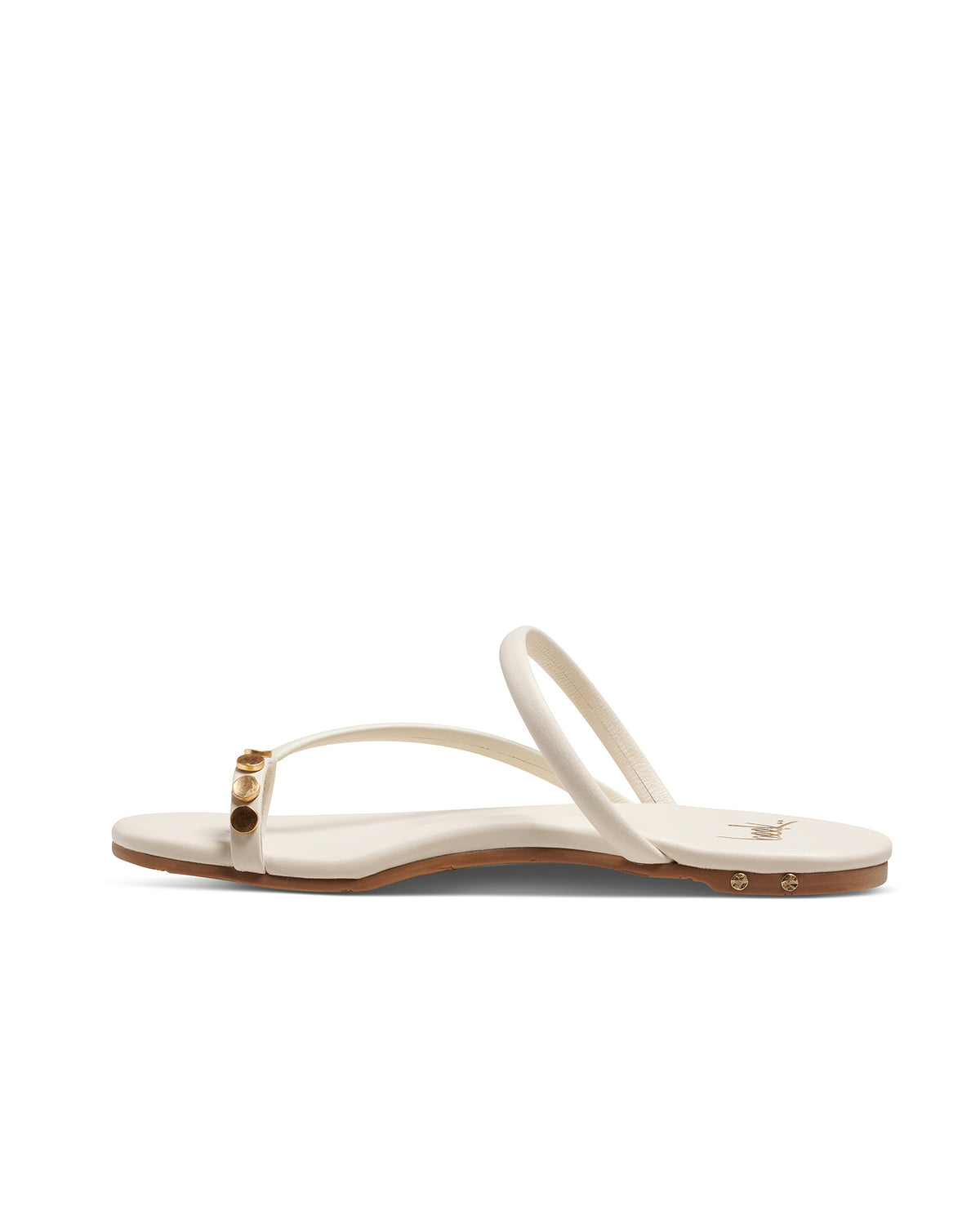 Starbird leather slide sandals in vanilla - product side shot