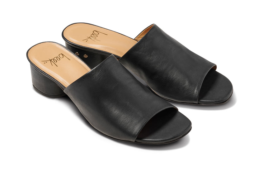 Stilt leather heeled sandal in black - product angle shot