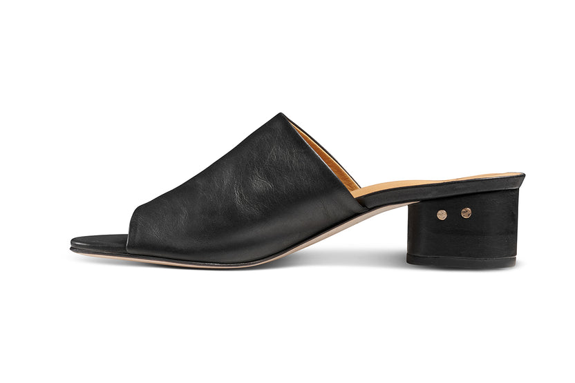 Stilt leather heeled sandal in black - product side shot