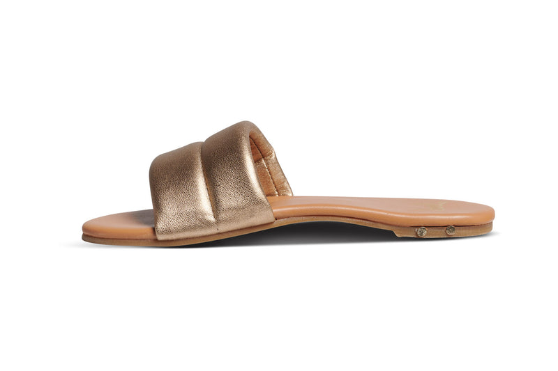 Sugarbird leather slide sandal in gold/honey - side shot