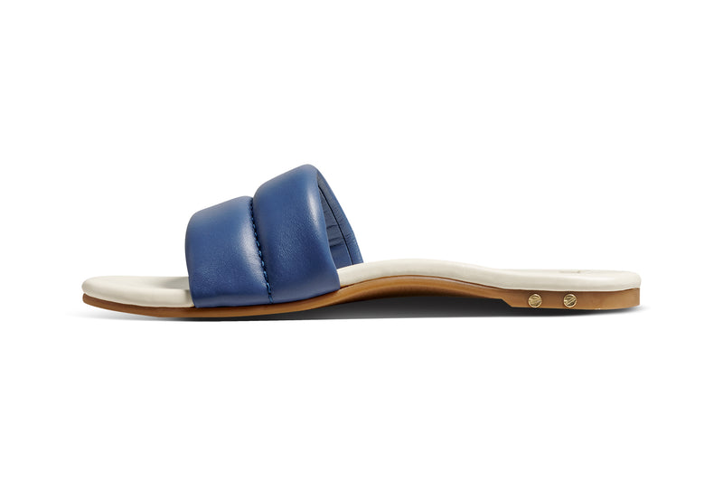 Sugarbird leather slide sandals in navy/vanilla - product side shot