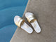 Sugarbird Leather Slide Sandal in platinum  by the pool