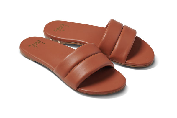 Sugarbird leather slide sandal in tan - angle shot
