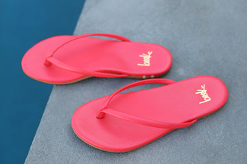 Sunbeam leather flip flop sandal in cherry by the pool