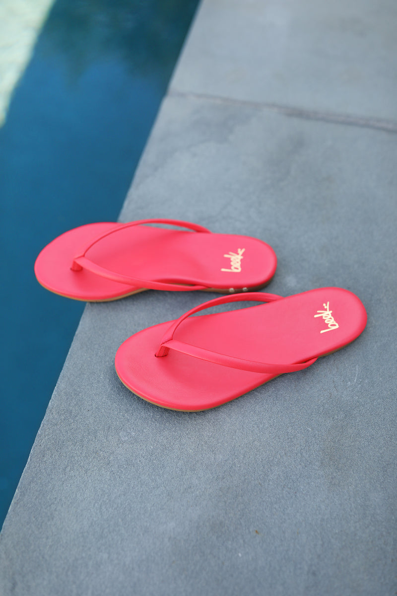 Sunbeam leather flip flop sandal in cherry by the pool
