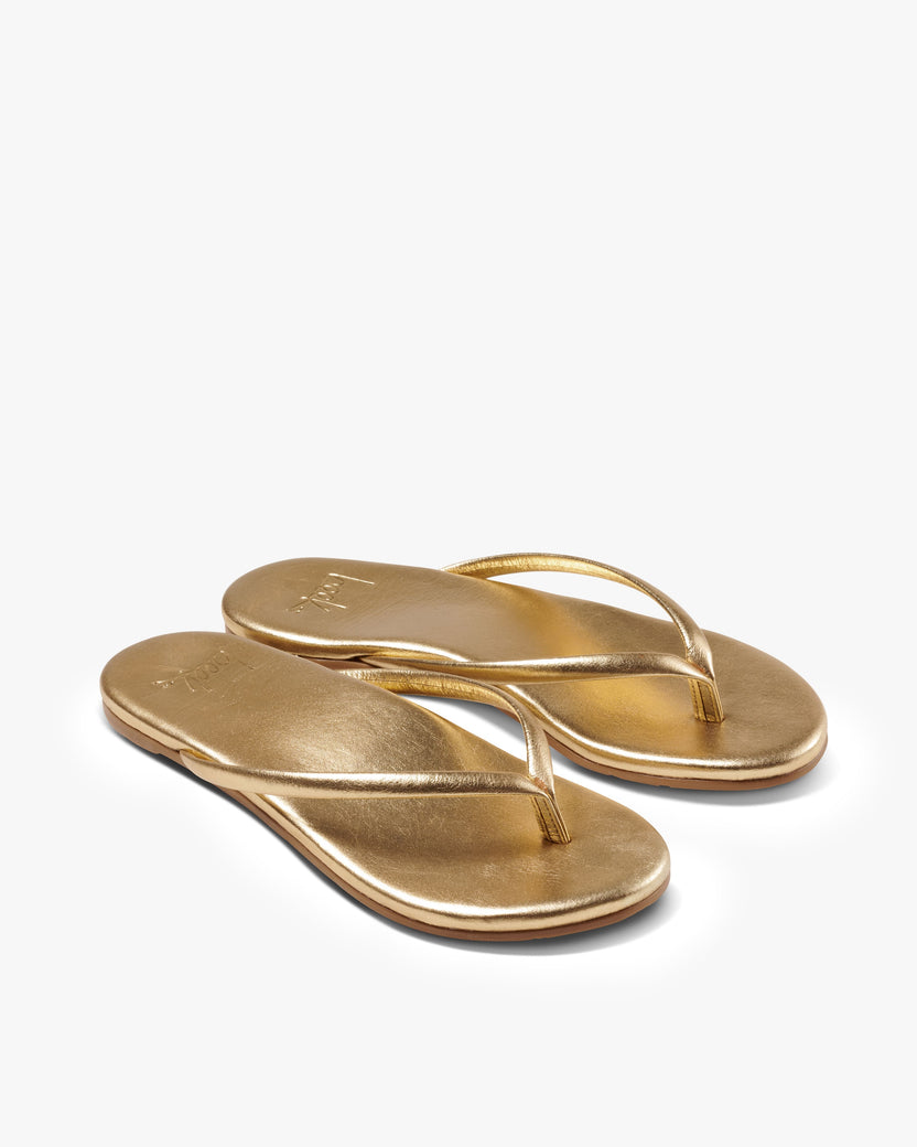 Sunbeam leather flip flop sandals in oro - product angle shot