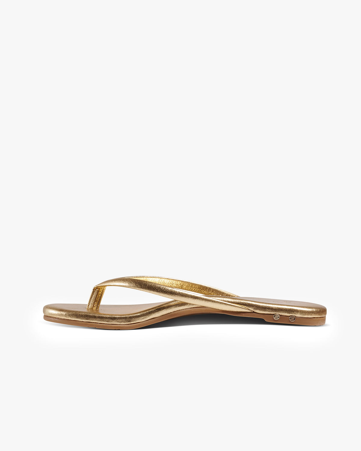 Sunbeam leather flip flop sandals in oro - product side shot