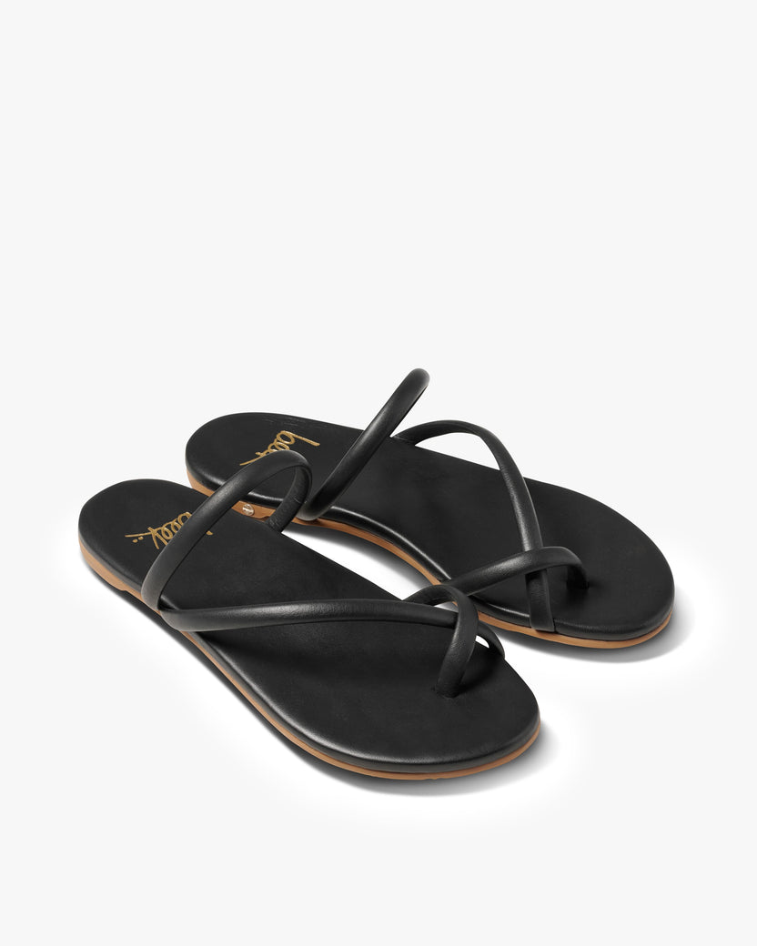 Sunbird leather slide sandals in black - product angle shot