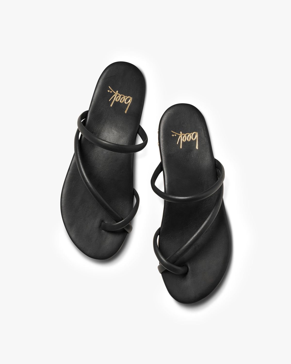 Sunbird leather slide sandals in black - product top shot