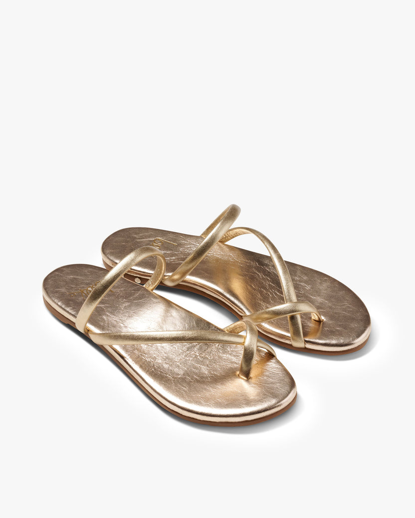Sunbird leather sandals in gold - product angle shot