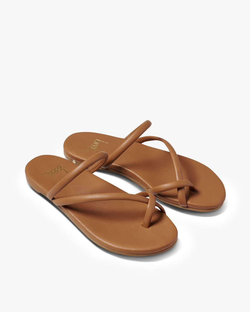 Sunbird leather slide sandals in tan - product angle shot