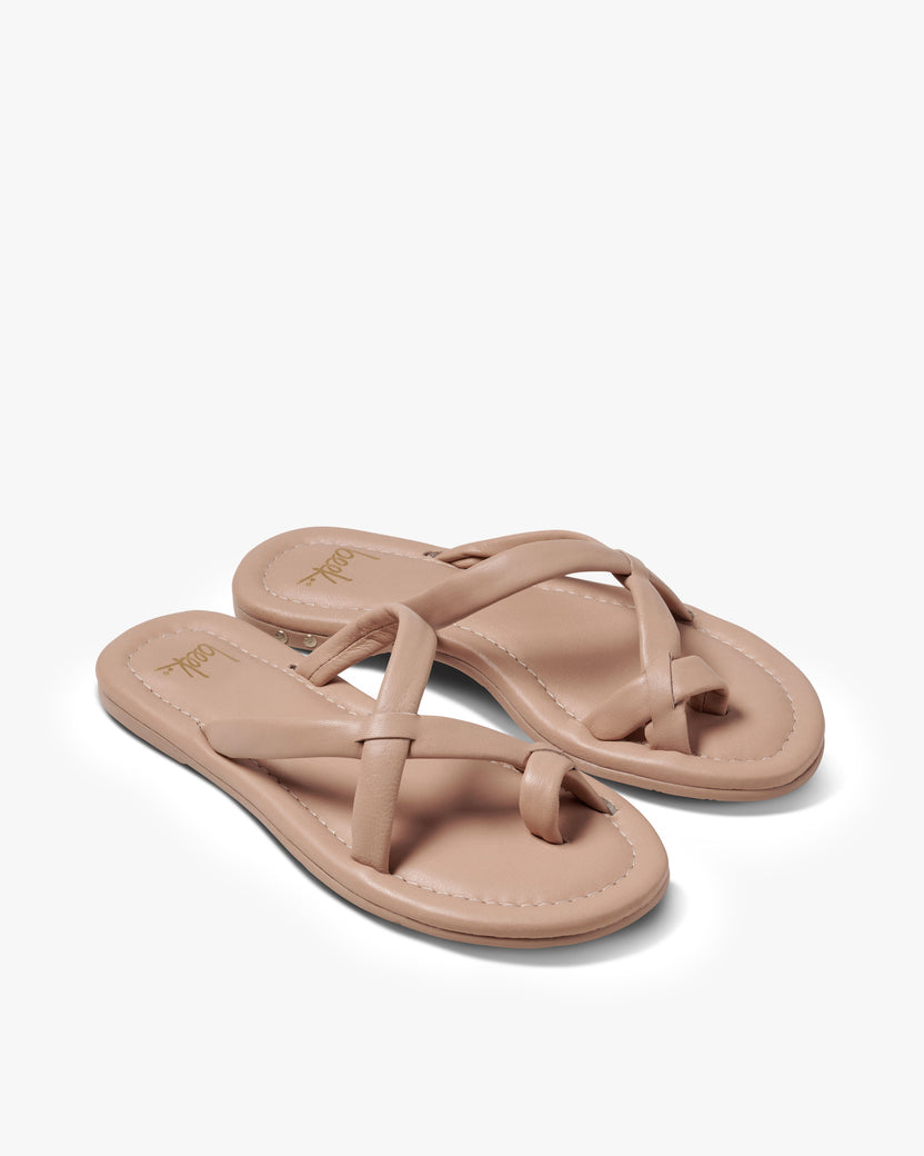 Sungem leather toe-ring sandals in beach - product angle shot