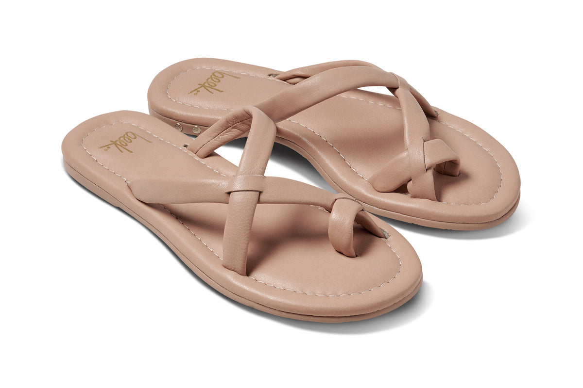 Sungem leather toe-ring sandals in beach - product angle shot