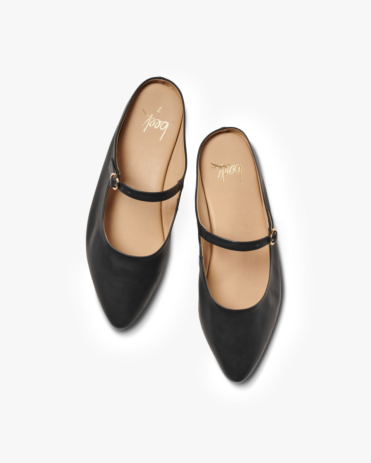 Swallow leather ballet mule in black - product side shot