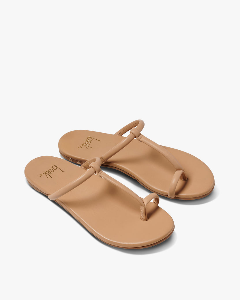 Teebird leather sandal in beach - product angle shot