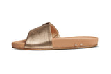 Tori leather slide sandal in gold/beach - side shot
