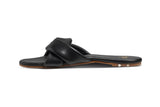 Twistybird leather slide sandal in black - side shot