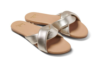 Twistybird leather sandals in platinum/beach - angle shot