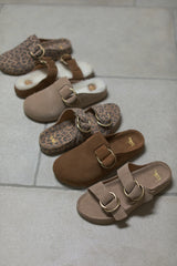 Buzzard suede sandal in stone, leopard, chestnut shearling. Vulture suede mules in chestnut and stone shearling.