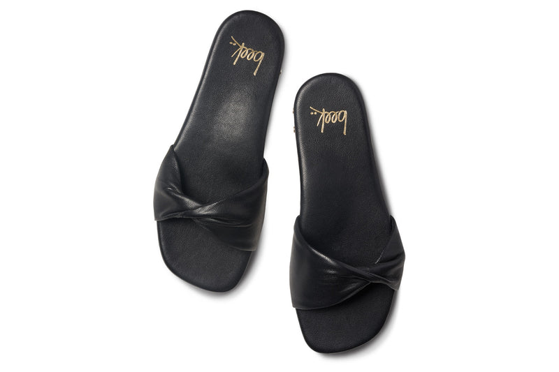 Whipbird leather slide sandal in black - top shot