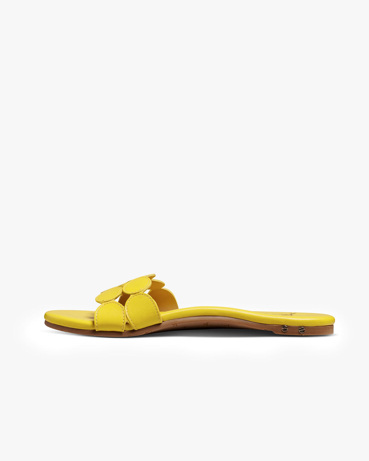 Whirlybird leather slide sandals in lemon - product side shot