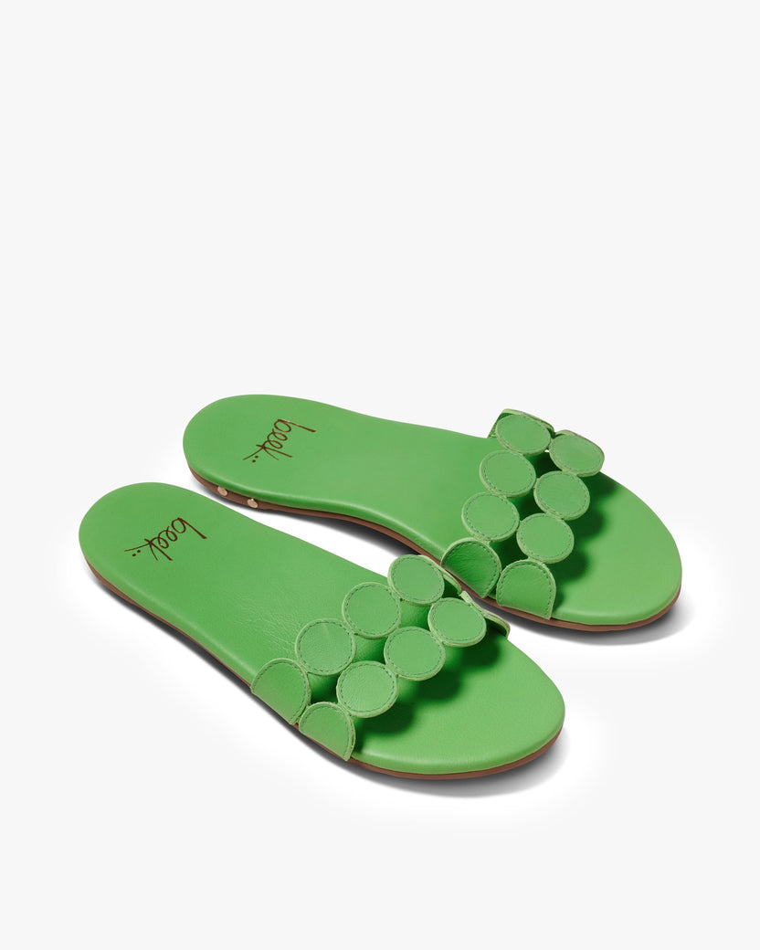 Whirlybird leather slide sandals in palm - product angle shot