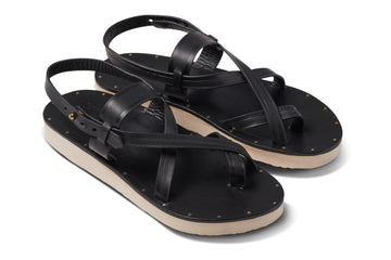 Wigeon burnished leather toe-ring sandal in black - angle shot