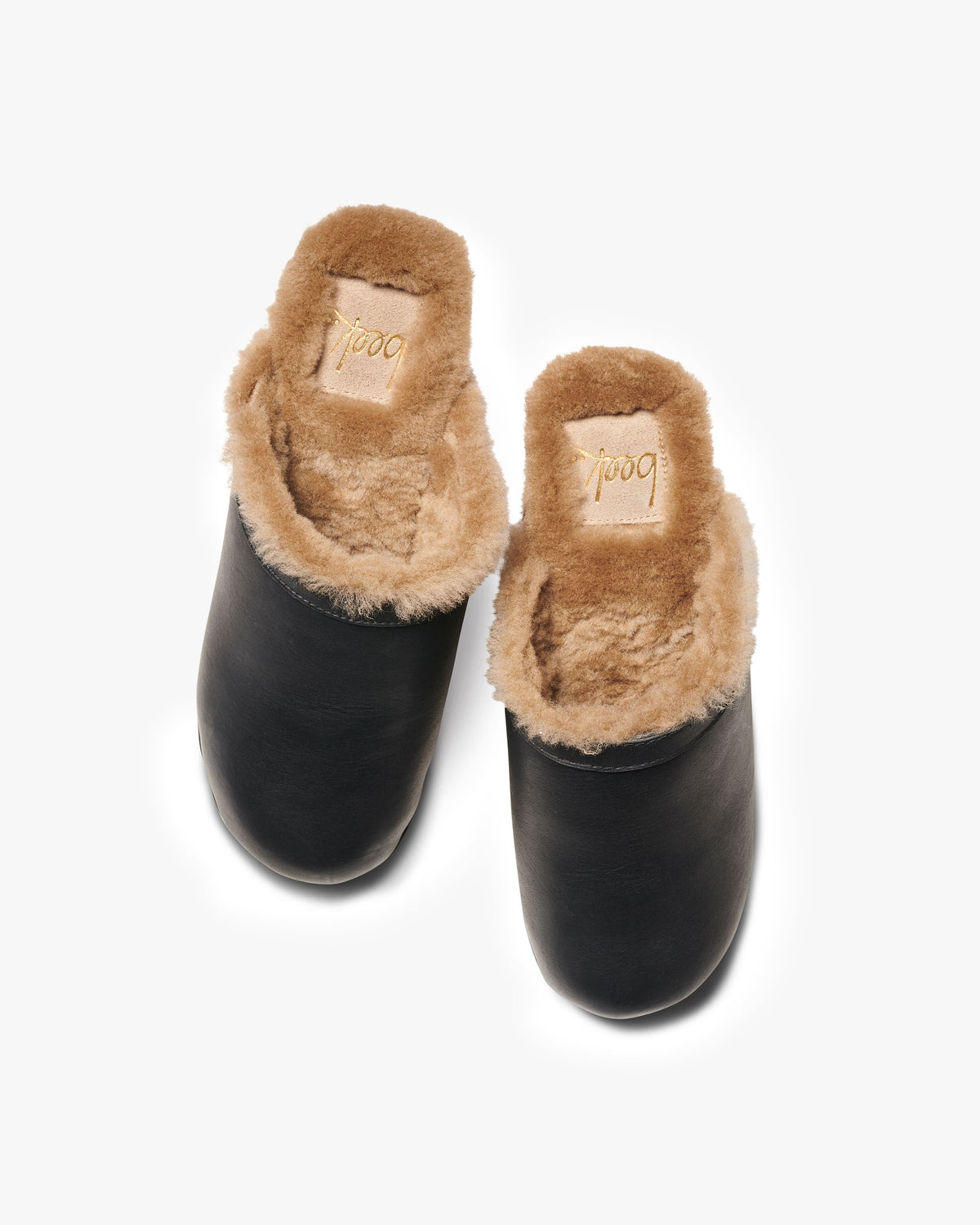 Woodpecker Shearling clogs in black - product top shot