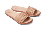 Chat leather slide sandal in beach - product angle shot