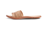 Chat leather slide sandal in beach - product side shot