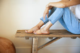 Woman wearing Chat leather slide sandal in beach