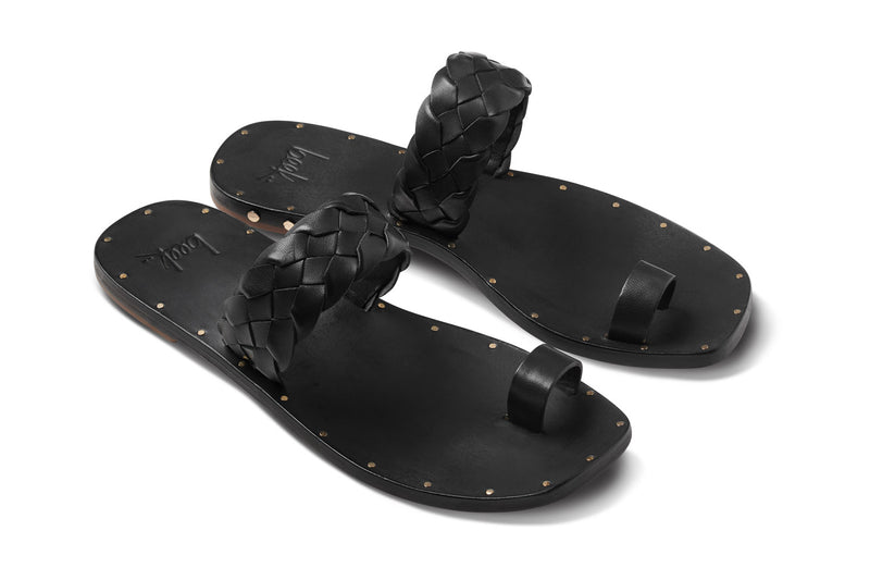 Cockatoo leather toe ring sandal in black - product angle shot