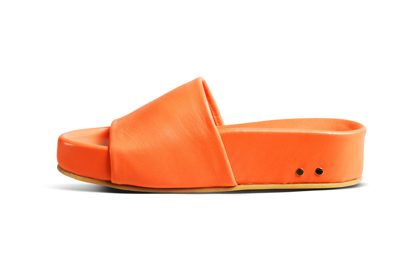 Pelican platform sandal in papaya - side shot