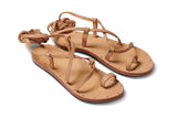 Seriema ankle wrap sandal - beach - angle shot